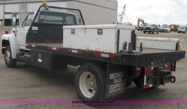 image for item A6096 1994 Ford F700 flatbed truck