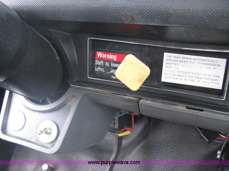 image for item A6096 1994 Ford F700 flatbed truck