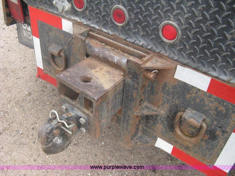 image for item A6096 1994 Ford F700 flatbed truck