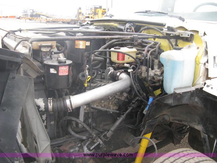 image for item A6096 1994 Ford F700 flatbed truck