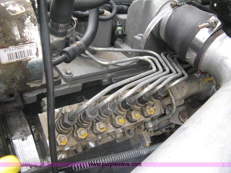 image for item A6096 1994 Ford F700 flatbed truck