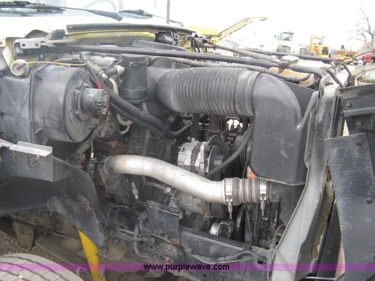 image for item A6096 1994 Ford F700 flatbed truck