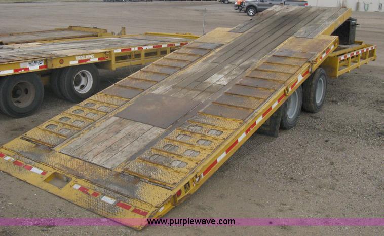 image for item A6102 2001 Trail King TKT20 tandem axle tilt bed trailer