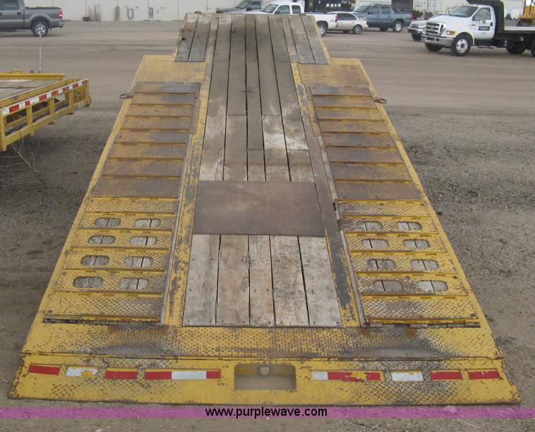 image for item A6102 2001 Trail King TKT20 tandem axle tilt bed trailer