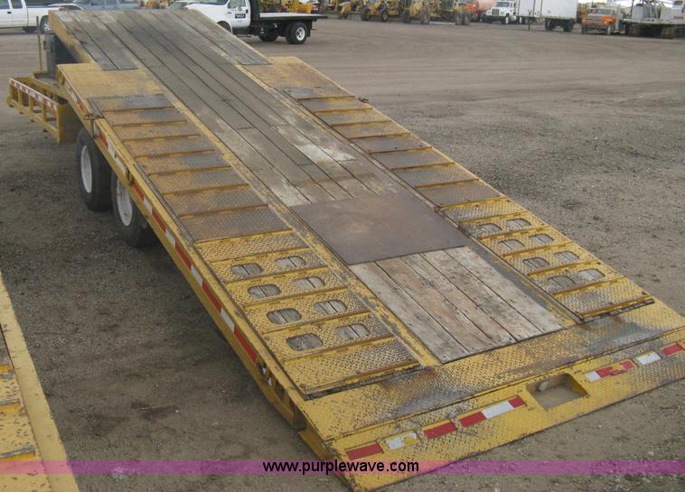 image for item A6102 2001 Trail King TKT20 tandem axle tilt bed trailer