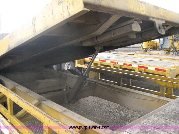 image for item A6102 2001 Trail King TKT20 tandem axle tilt bed trailer