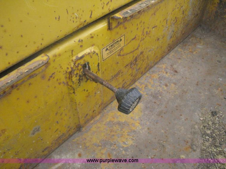 image for item A6102 2001 Trail King TKT20 tandem axle tilt bed trailer