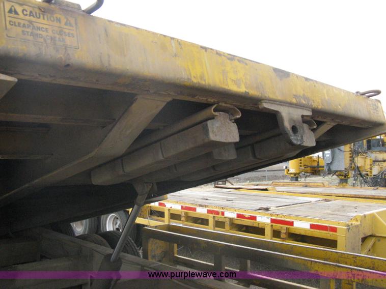 image for item A6102 2001 Trail King TKT20 tandem axle tilt bed trailer