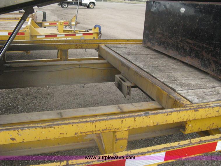 image for item A6102 2001 Trail King TKT20 tandem axle tilt bed trailer