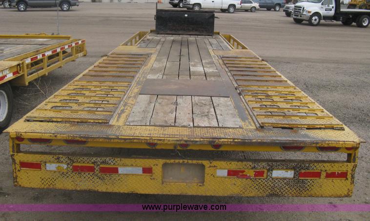 image for item A6102 2001 Trail King TKT20 tandem axle tilt bed trailer