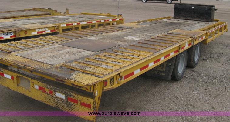 image for item A6102 2001 Trail King TKT20 tandem axle tilt bed trailer