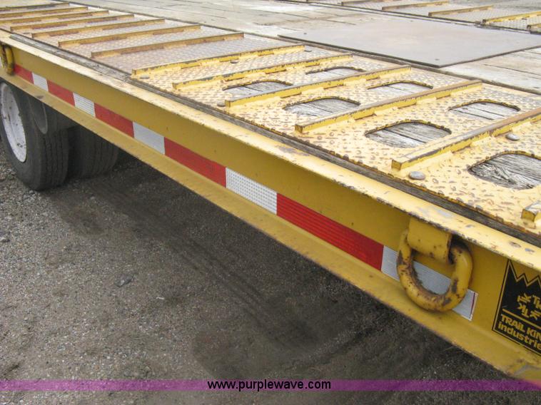 image for item A6102 2001 Trail King TKT20 tandem axle tilt bed trailer
