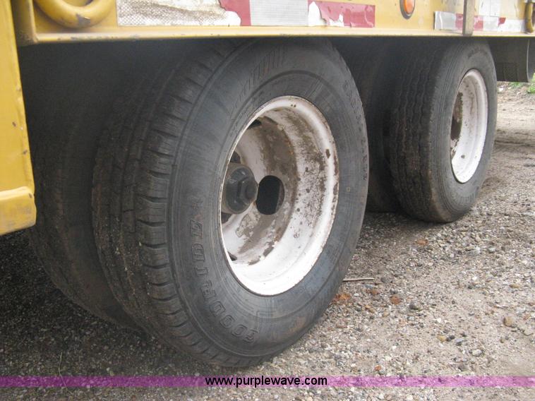 image for item A6102 2001 Trail King TKT20 tandem axle tilt bed trailer