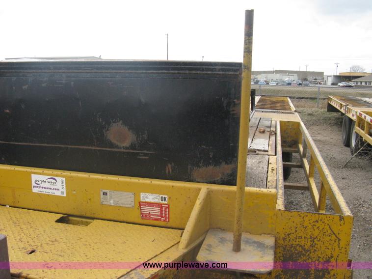 image for item A6102 2001 Trail King TKT20 tandem axle tilt bed trailer