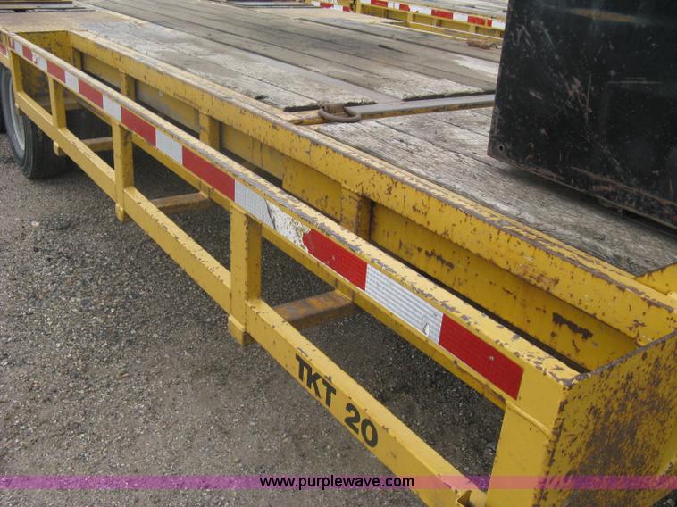 image for item A6102 2001 Trail King TKT20 tandem axle tilt bed trailer