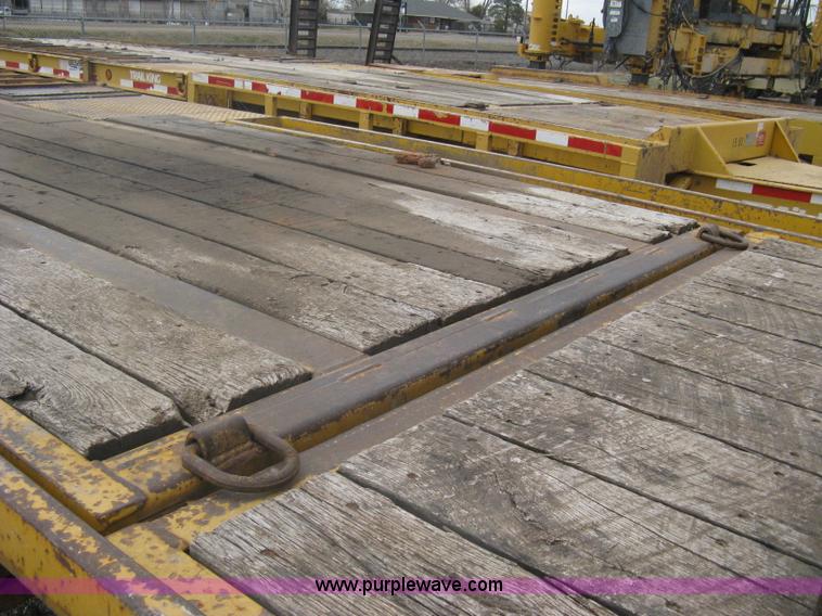 image for item A6102 2001 Trail King TKT20 tandem axle tilt bed trailer