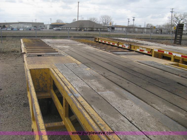 image for item A6102 2001 Trail King TKT20 tandem axle tilt bed trailer