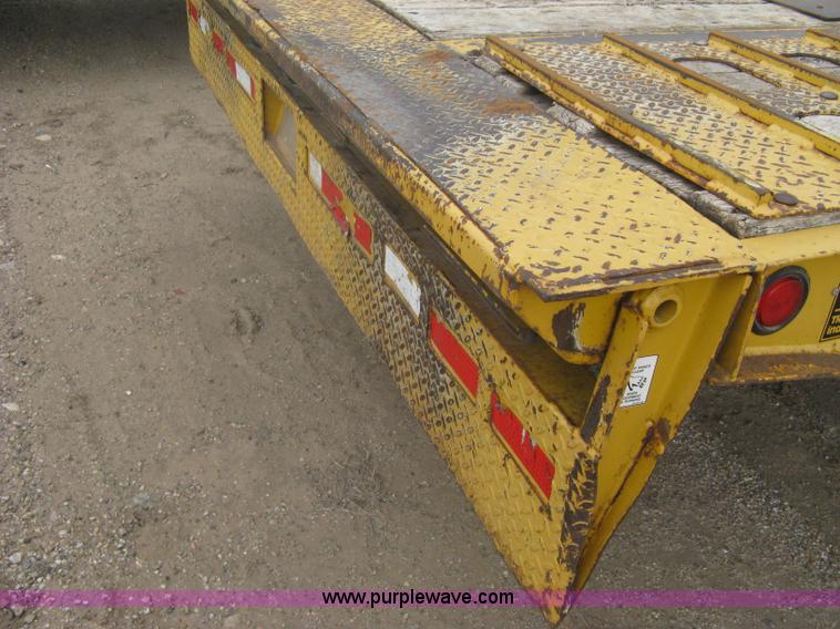 image for item A6102 2001 Trail King TKT20 tandem axle tilt bed trailer