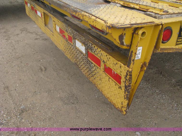 image for item A6102 2001 Trail King TKT20 tandem axle tilt bed trailer