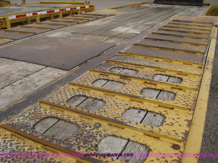 image for item A6102 2001 Trail King TKT20 tandem axle tilt bed trailer