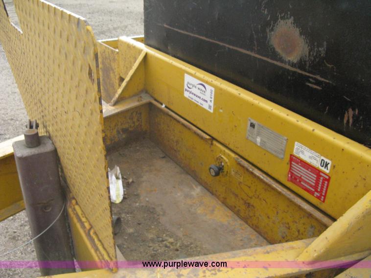 image for item A6102 2001 Trail King TKT20 tandem axle tilt bed trailer