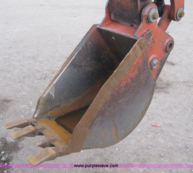 image for item A6115 2004 Ditch Witch RT55H backhoe trencher