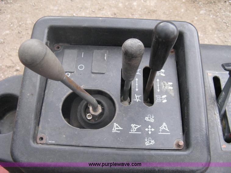 image for item A6115 2004 Ditch Witch RT55H backhoe trencher