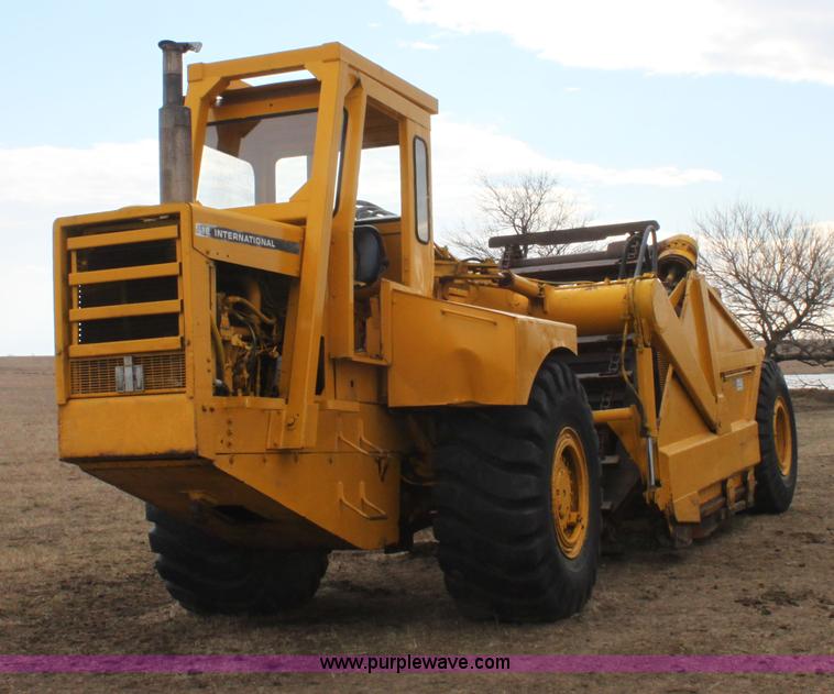 image for item A7377 International Harvester 412 paddle scraper