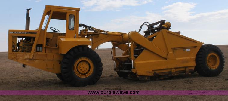 image for item A7377 International Harvester 412 paddle scraper