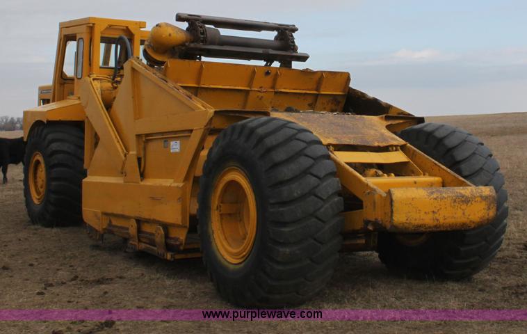 image for item A7377 International Harvester 412 paddle scraper