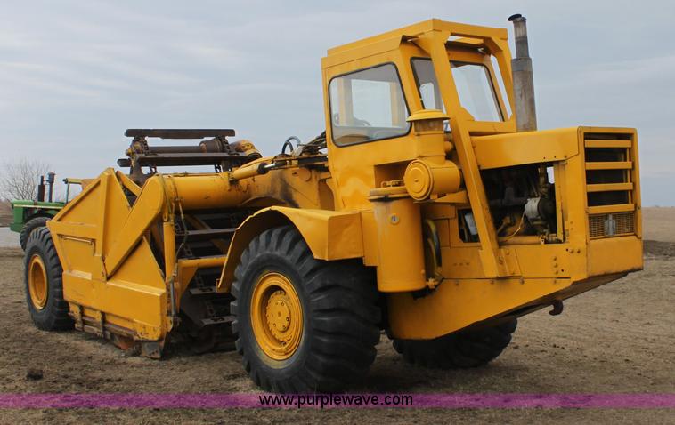 image for item A7377 International Harvester 412 paddle scraper