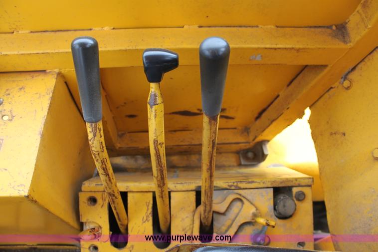 image for item A7377 International Harvester 412 paddle scraper