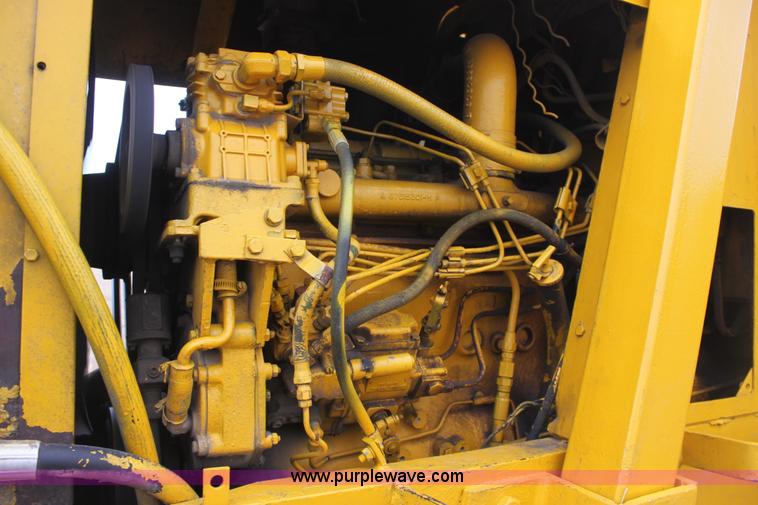 image for item A7377 International Harvester 412 paddle scraper