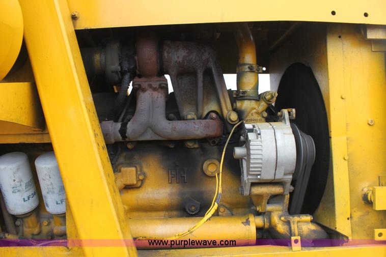 image for item A7377 International Harvester 412 paddle scraper