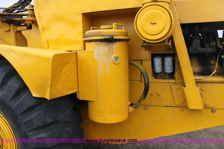 image for item A7377 International Harvester 412 paddle scraper