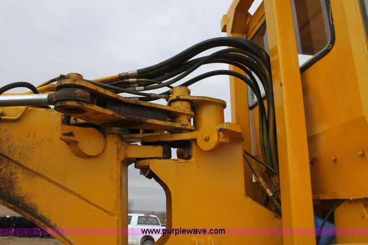 image for item A7377 International Harvester 412 paddle scraper