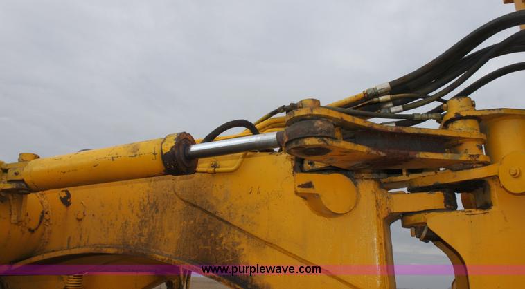 image for item A7377 International Harvester 412 paddle scraper