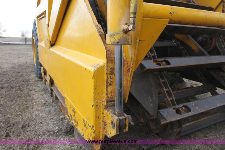 image for item A7377 International Harvester 412 paddle scraper