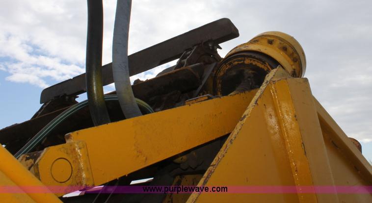 image for item A7377 International Harvester 412 paddle scraper