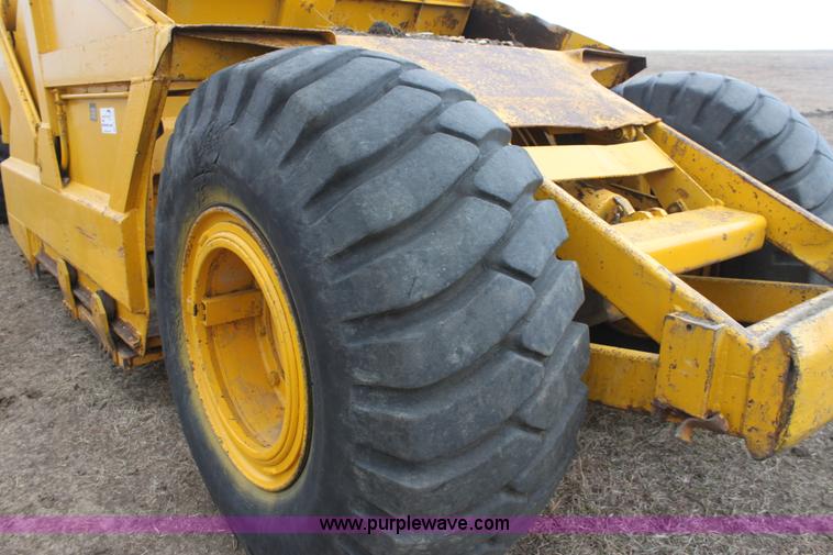 image for item A7377 International Harvester 412 paddle scraper