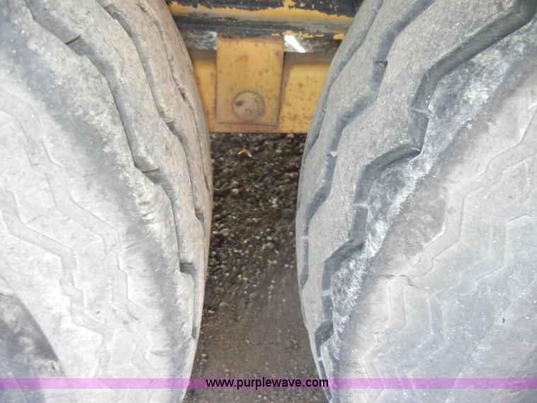 image for item C4064 2000 Redi Haul 20' triple axle flatbed trailer