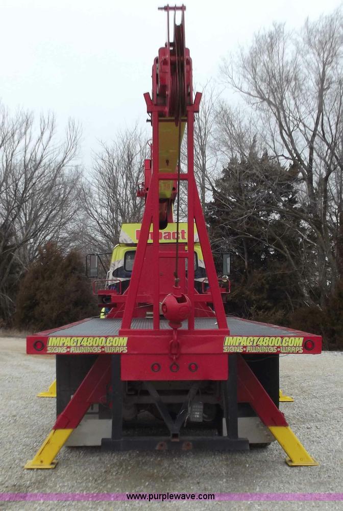 image for item D3504 1979 Ford flatbed truck with crane