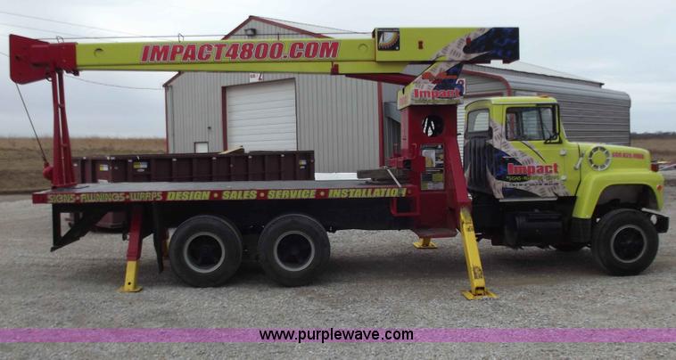 image for item D3504 1979 Ford flatbed truck with crane