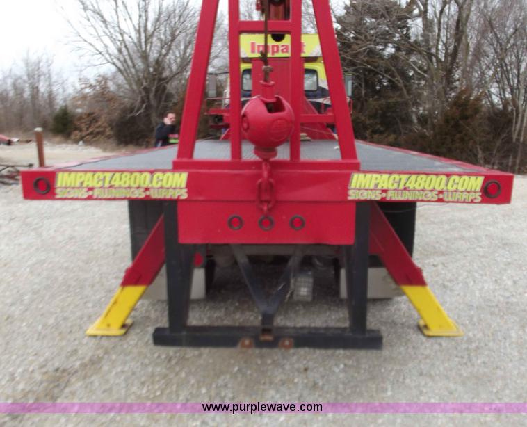 image for item D3504 1979 Ford flatbed truck with crane