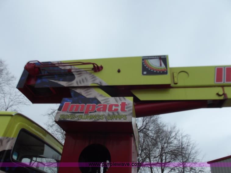 image for item D3504 1979 Ford flatbed truck with crane