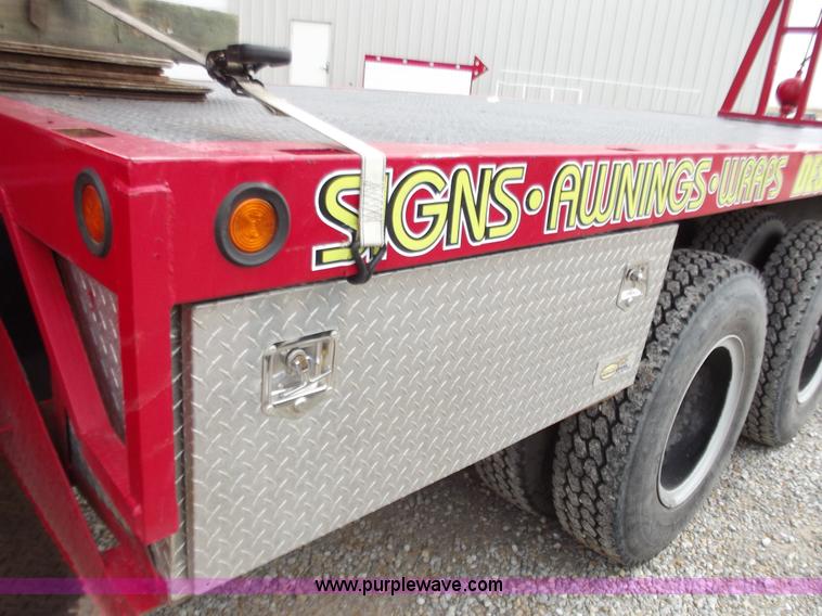 image for item D3504 1979 Ford flatbed truck with crane