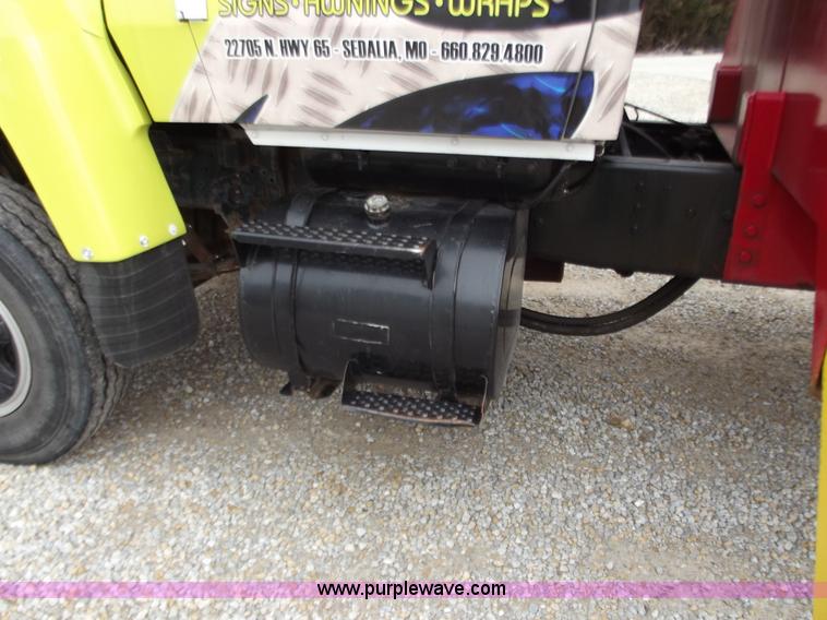 image for item D3504 1979 Ford flatbed truck with crane