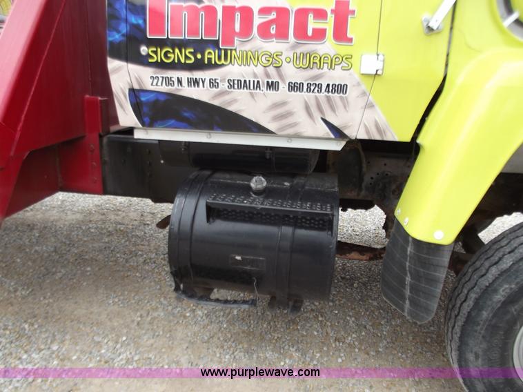 image for item D3504 1979 Ford flatbed truck with crane