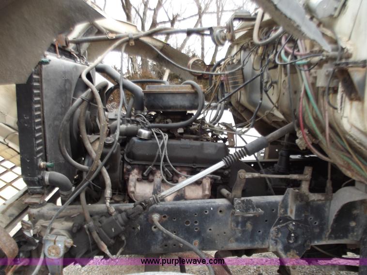 image for item D3504 1979 Ford flatbed truck with crane