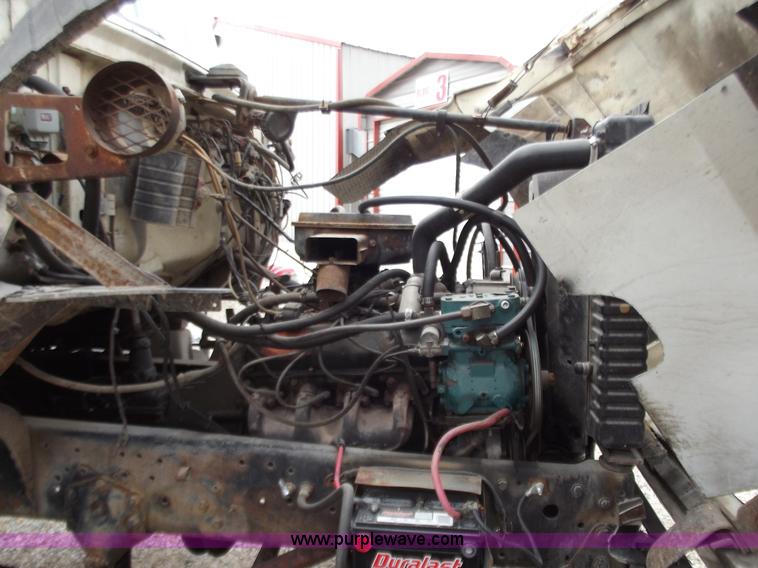 image for item D3504 1979 Ford flatbed truck with crane